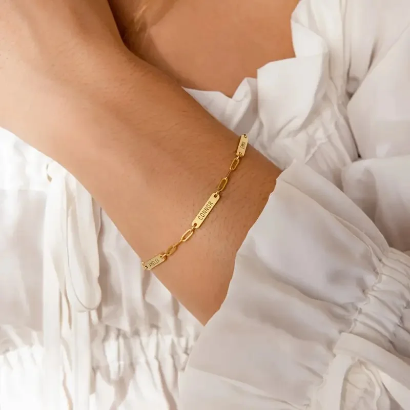 Personalized three-name bracelet worn on wrist